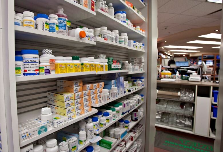 Canadian patients and groups representing them are sounding the alarm about recent changes made by the federal government to the way it regulates the cost of patented medicines. Shelves of medication are seen at a pharmacy in Quebec City, Thursday, March 8, 2012