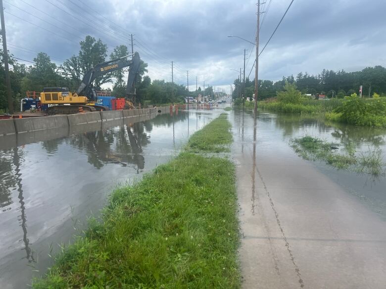 Oxford Street West was closed to traffic between Proudfoot Lane and Platts Lane due to heavy flooding on Monday.