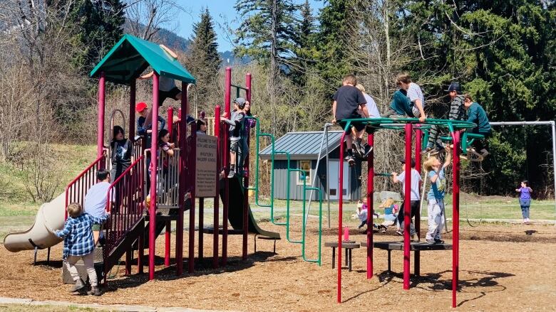 Kids play on the playground at the Whistler Waldorf School located at Whistler's Spruce Grove Park.