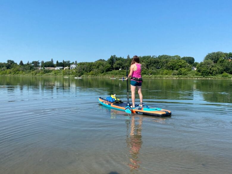 Rebecca Mollison, a volunteer with Saskatoon Search and Rescue, heads out on the South Saskatchewan River this week with all of her safety gear.