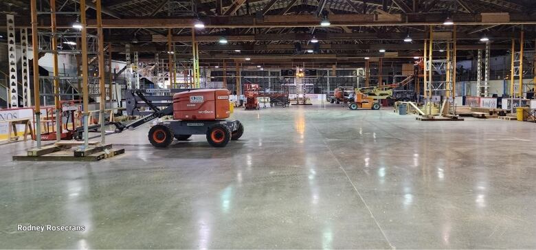 the inside of an arena is full of scaffolding and construction equipment 