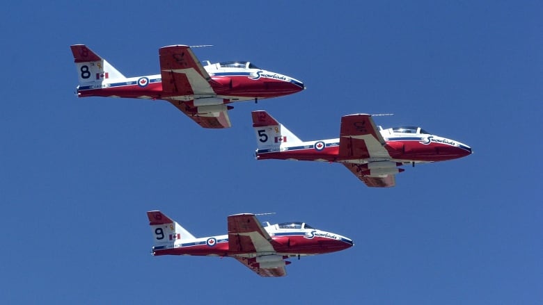 The Canadian Air Force Snowbirds fly over Great Falls, Mont., on Friday, June 1, 2007 after the pilots retrieved their jets Friday, which have been grounded since the fatal May 18, 2007 crash at Malmstrom Air Force Base, Mont. The crash killed Snowbird pilot Capt. Shawn McCaughey. The CT-114 Tudor jets were cleared to leave after investigators from the Canadian Forces flight safety team returned to Ottawa last weekend. Their final report is expected to be complete within a year.