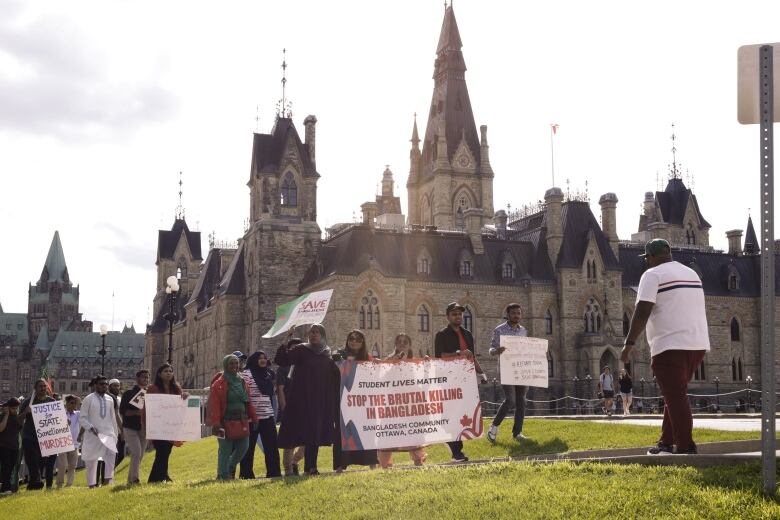 Protestors march on Parliament Hill in Ottawa. 