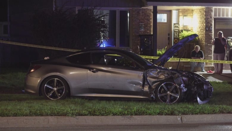 A crashed sedan at the scene of a fatal collision in Bowmanville on July 21, 2024.