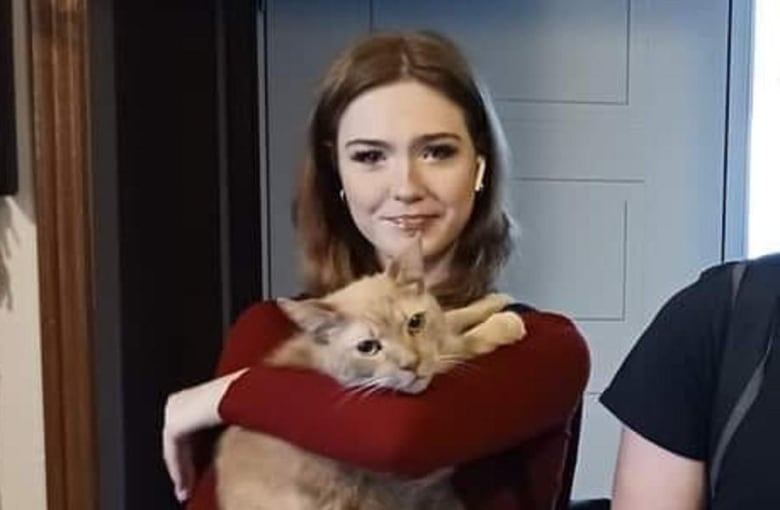 Breanna Broadfoot and her family's cat, Stitch, in an undated photo.