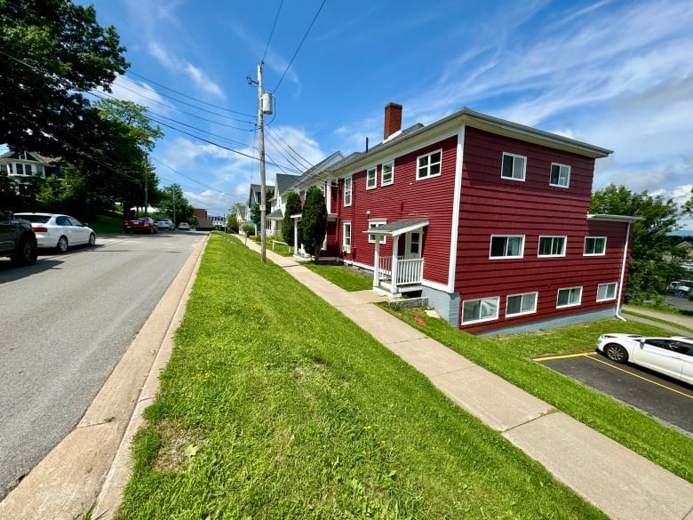 A red house on a street in Wolfville, N.S.