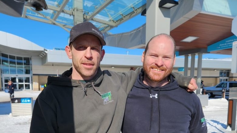 Will Hardy, left, drops his brother Winton oat the Saskatoon airport in April on his way to serve on the Ukrainian front lines. Winton, also known as 