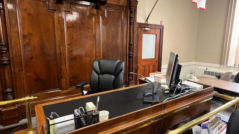 A close of a judge's desk inside a courtroom