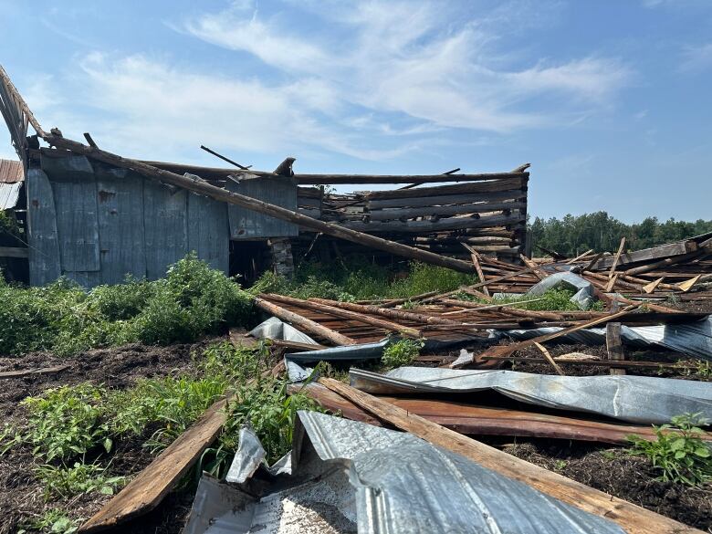 A barn torn to pieces from a tornado