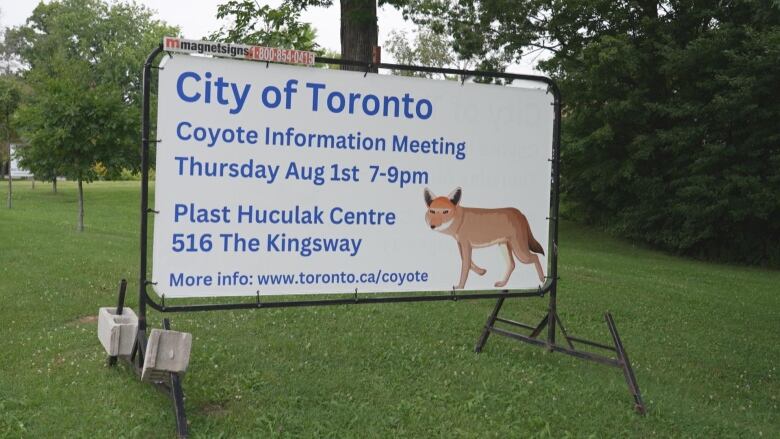 Photograph of a sign in a park reading: 