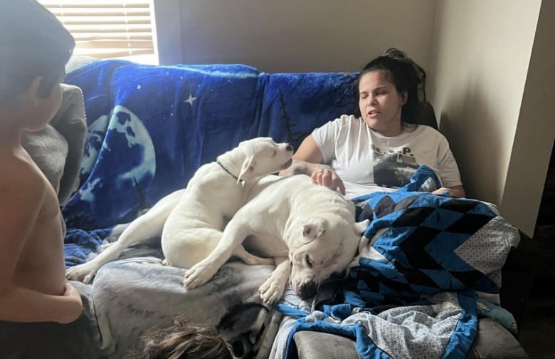 A woman and her two dogs