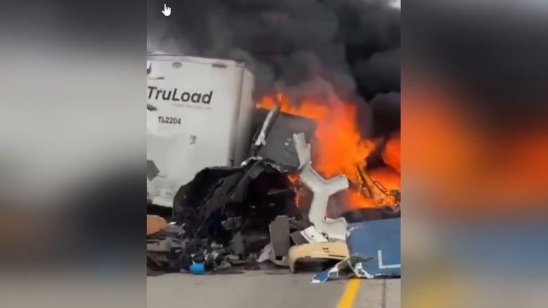 A truck in flames.