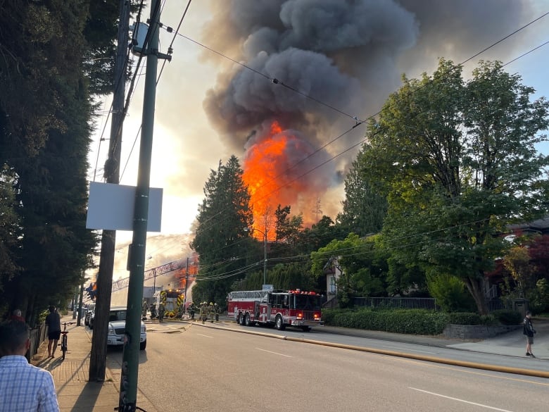 A large plume of smoke and fire rising.