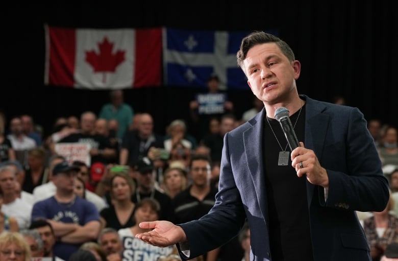 Conservative Leader Pierre Poilievre speaks during a rally in Montreal, Wednesday, June 19, 2024. The Conservatives say they have no connection to a rash of social media bots that flooded the X platform following a Pierre Poilievre event in northern Ontario last week. THE CANADIAN PRESS/Christinne Muschi