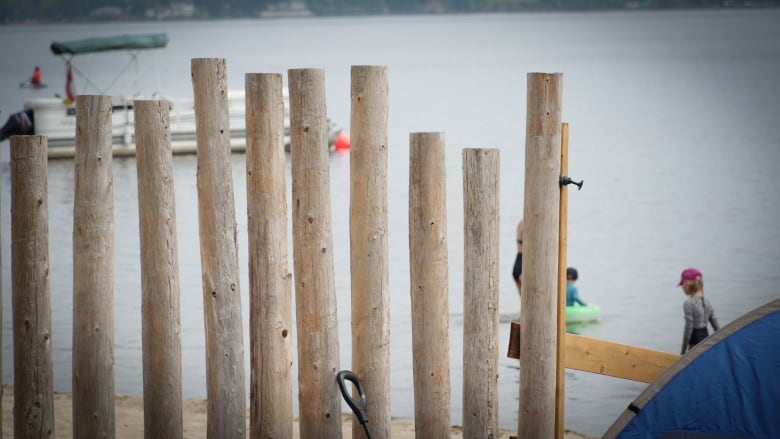 Fence sitting along Constance Bay beach at 121 Lane Street.