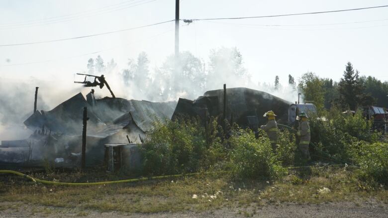 A house with smoke around it 