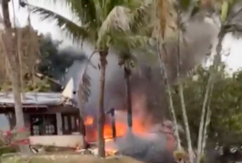 A frame grab from video shows fire resulting from a plane crash in Vinhedo, in Brazil's Sao Paulo state, on Friday.