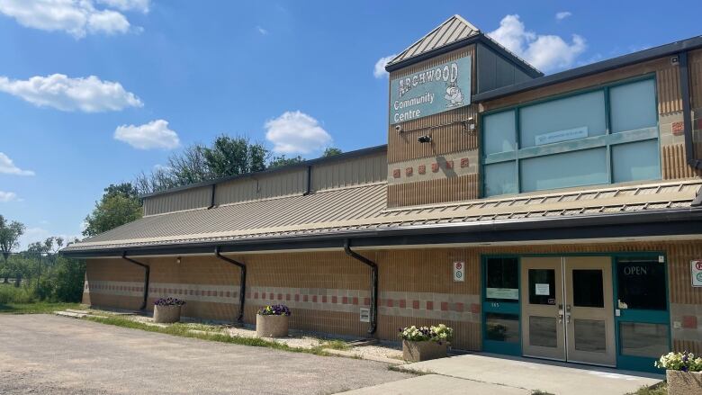 A building with a sign that says 'Archwood Community Centre.'