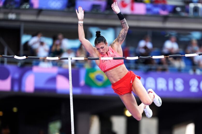 Anicka Newell, of Canada, warms up during women's pole vault qualification at the 2024 Summer Olympics, Monday, Aug. 5, 2024, in Saint-Denis, France. 