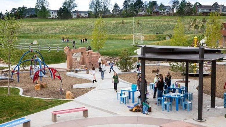 Conceptual drawing of a park with a playground at the bottom of a hill