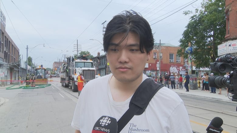 Photo of a man in a downtown street