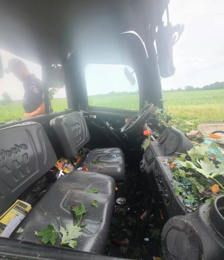 A look inside at the farm vehicle that was hit by a large tree limb during an Aug. 5 downburst in Chatham-Kent near Rondeau Provincial Park.