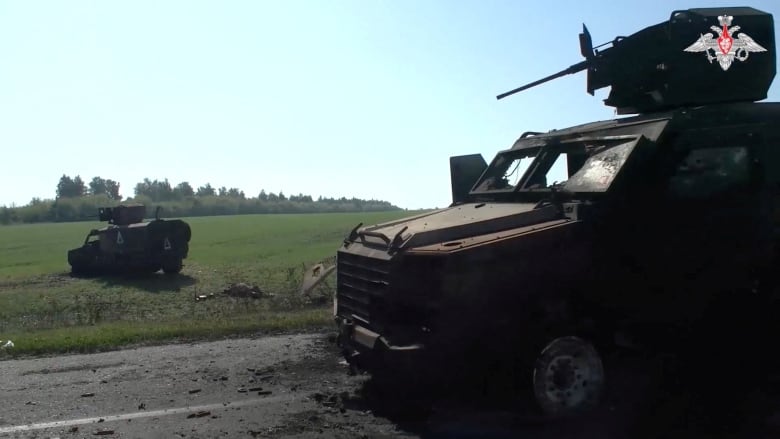 A screen shot from a video released  by Russia's Ministry of Defence on Aug. 20 shows what officials claim is a destroyed Ukrainian convoy in the Kursk region, Among the damaged vehicles, are at least two armoured personnel carriers made by Canadian company Roshel. 