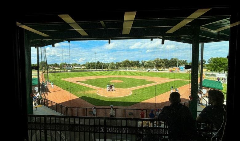 Inside a baseball grandstand.