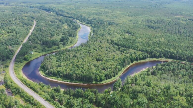 Aerial photo of salmon river winding next to Route 116.