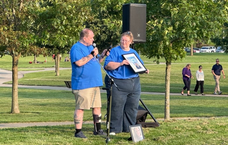 Dan Jennings and his wife Michelle speaking at a vigil for Breanna Broadfoot on July 24, 2024. Jennings has become an advocate for ending domestic violence after losing his daughter Caitlin in July 2023. 