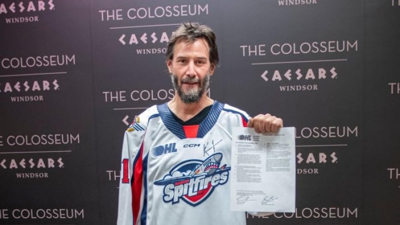 Hollywood actor Keanu Reeves signed a one-day contract with the OHL's Windsor Spitfires, a team he nearly tried out for if not for injury back when he was a teenager.