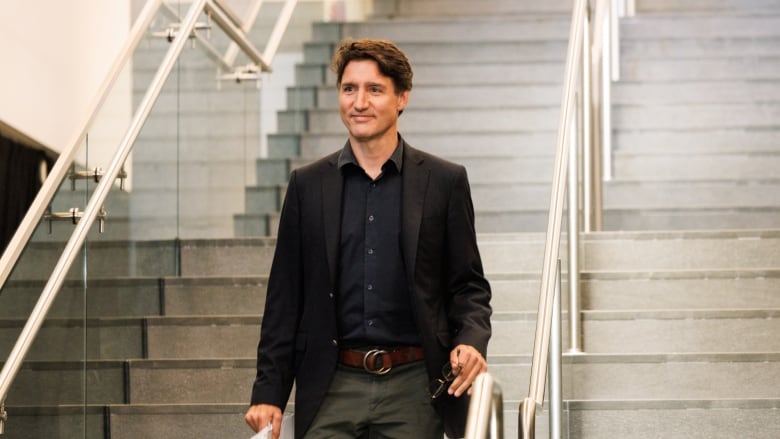 Prime Minister Justin Trudeau arrives to the Sunday evening cabinet retreat dinner at the Halifax Convention Centre on Sunday Aug. 25, 2024.