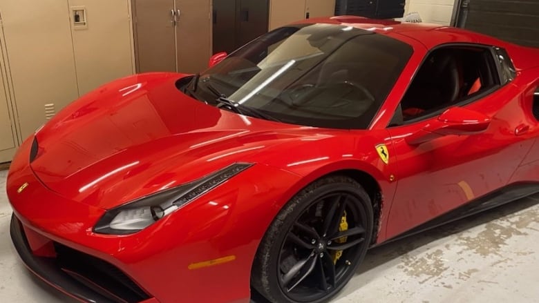 a photo of a red Farrari sports car.