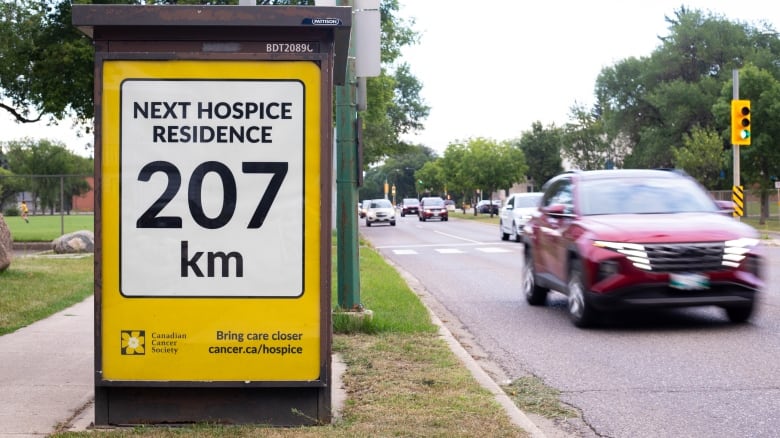 A sign that says the nearest hospice residence is 207 kilometres away.