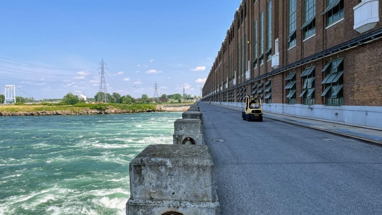 wide view of water and generating station 