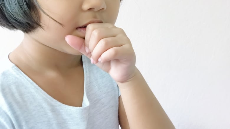 Sick asian little child girl cough from common cold.; Shutterstock ID 1218634759