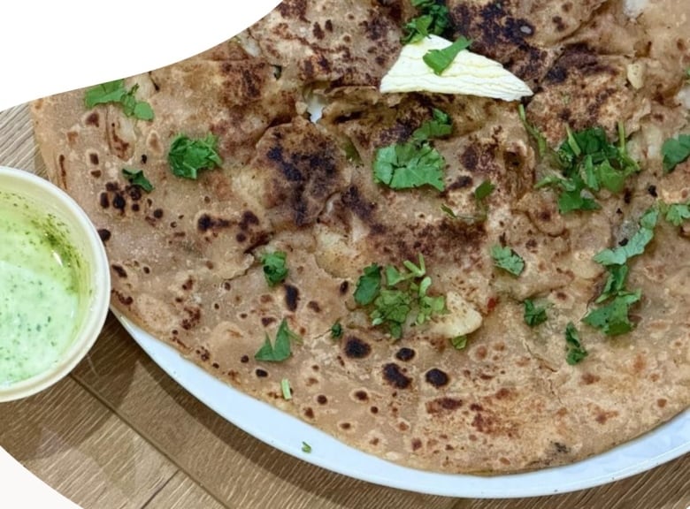 A South Asian food dish involving flatbread.