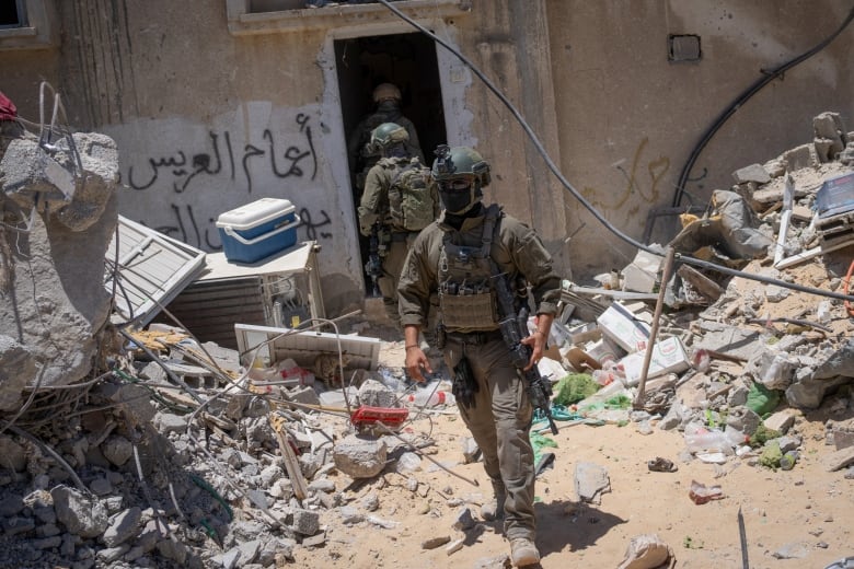 Israeli soldiers operate during a ground operation in the southern Gaza Strip, amid the Israel-Hamas conflict, July 3, 2024. The Israeli military invited reporters for a tour of Rafah, where the military has been operating since May 6. 