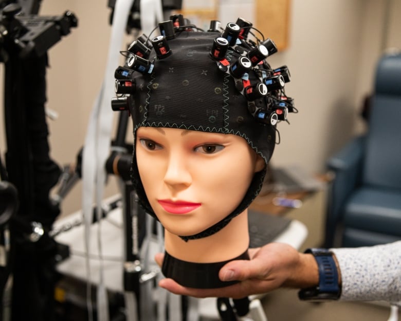 The fNIR device worn by study participants is seen on a mannequin head at University Hospital in London, Ont., on Sept. 4, 2024.