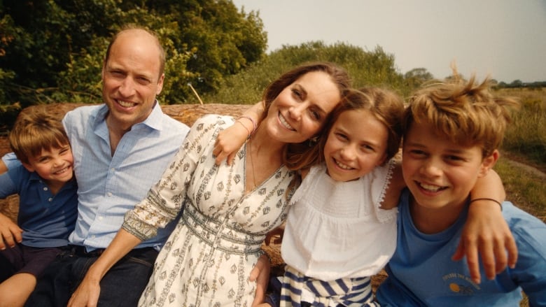 A family of five is seen in a photo.