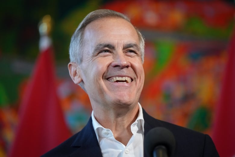 Former Bank of Canada governor Mark Carney laughs while speaking to reporters at the Liberal caucus retreat in Nanaimo, B.C., on Tuesday, September 10, 2024.