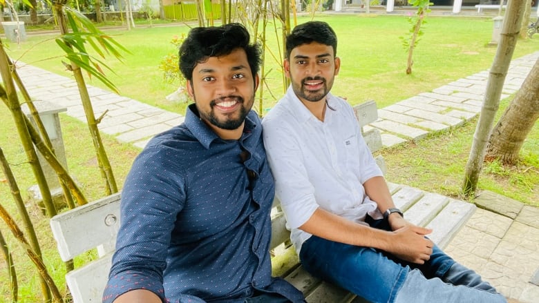 Roshan Mathew, left, sits with his brother-in-law Jibin Benoy in an undated photo. The two were close when they came to Canada from Kerala, India, with hopes to study in college and obtain their permanent residencies. In 2022, those dreams were cut short after Benoy was killed in an unsolved hit-and-run while riding his bike home from a late night shift at his part-time job. 