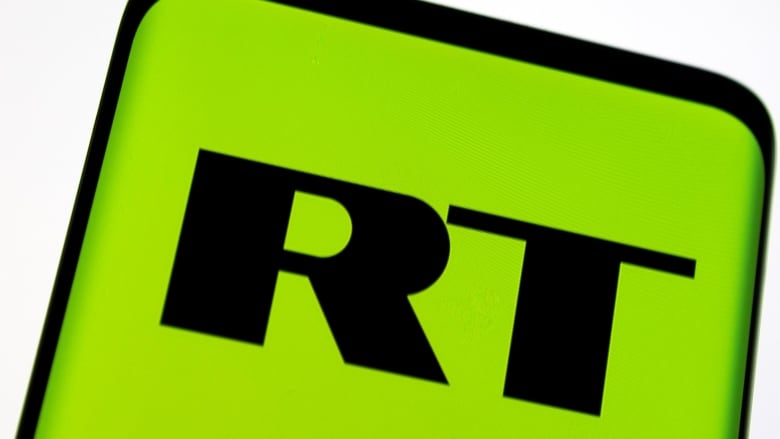 A logo of a state media network is shown