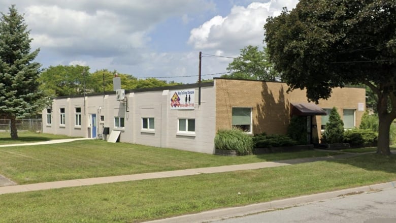 brick building with way to grow daycare sign