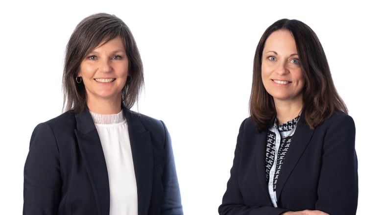 Two women in business attire are pictured on a white background