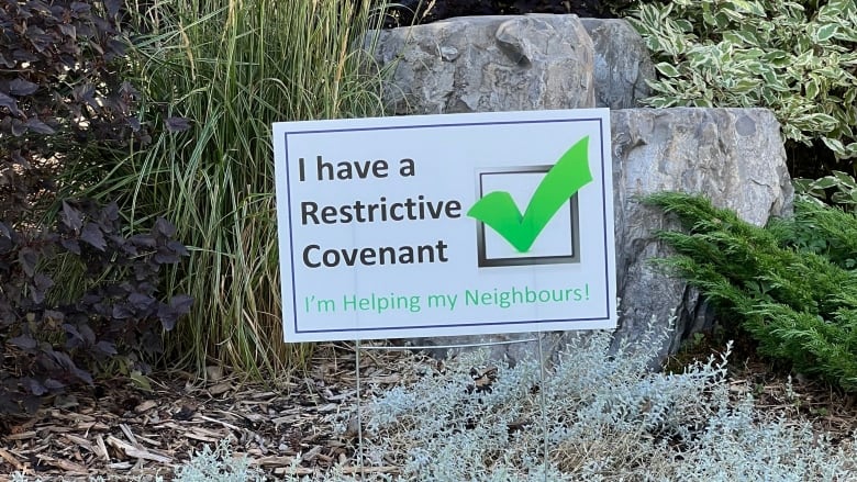 A lawn sign saying 