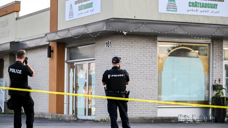 police in front of building