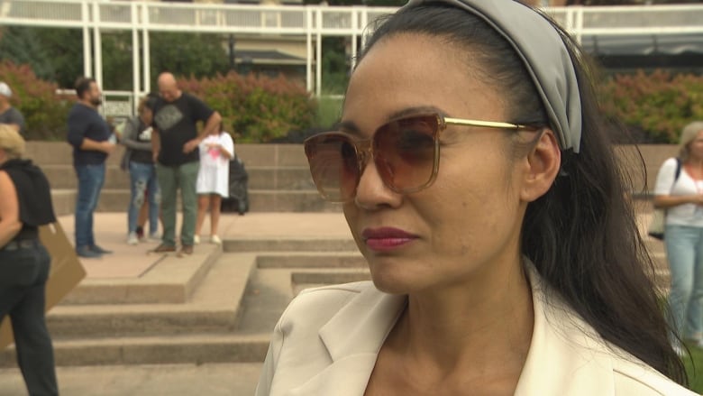 Photo of a woman in sunglasses