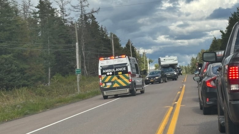 Ambulance at side of highway.