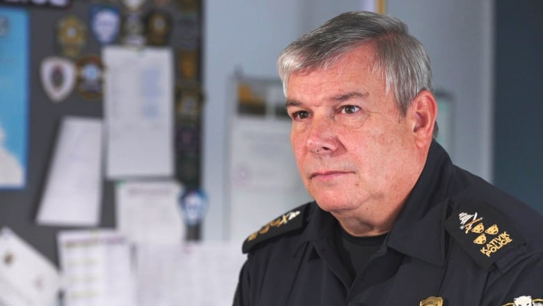 A chief of police in his office. 